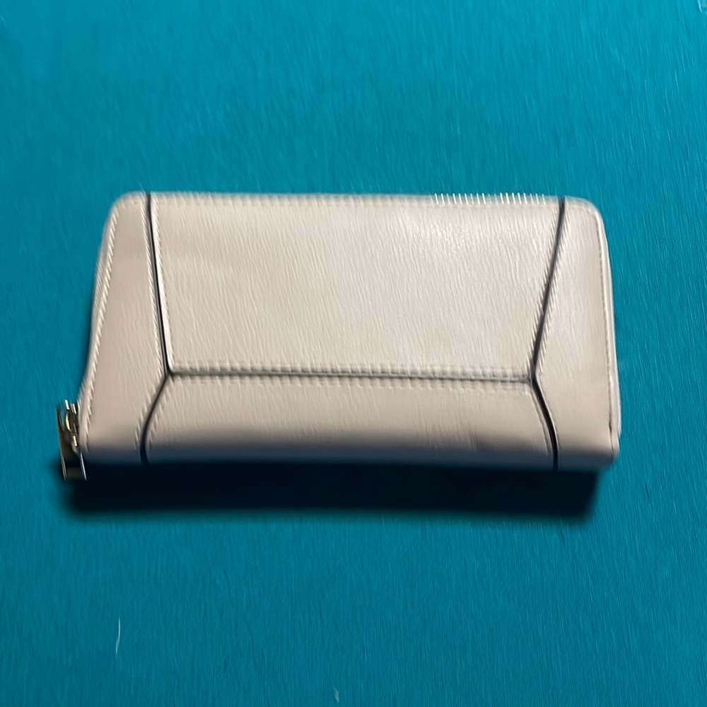 Wallet with 8 card slots.